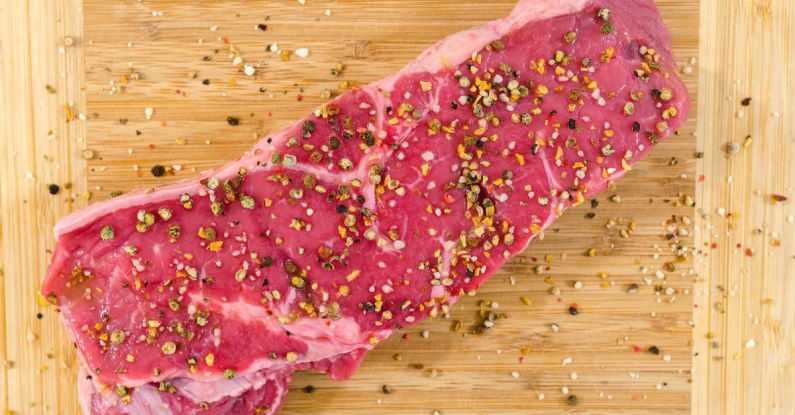 Protein - Raw Meat on Beige Wooden Surface