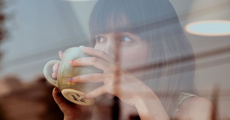 Savoring - Photo of Woman Drinking Coffee